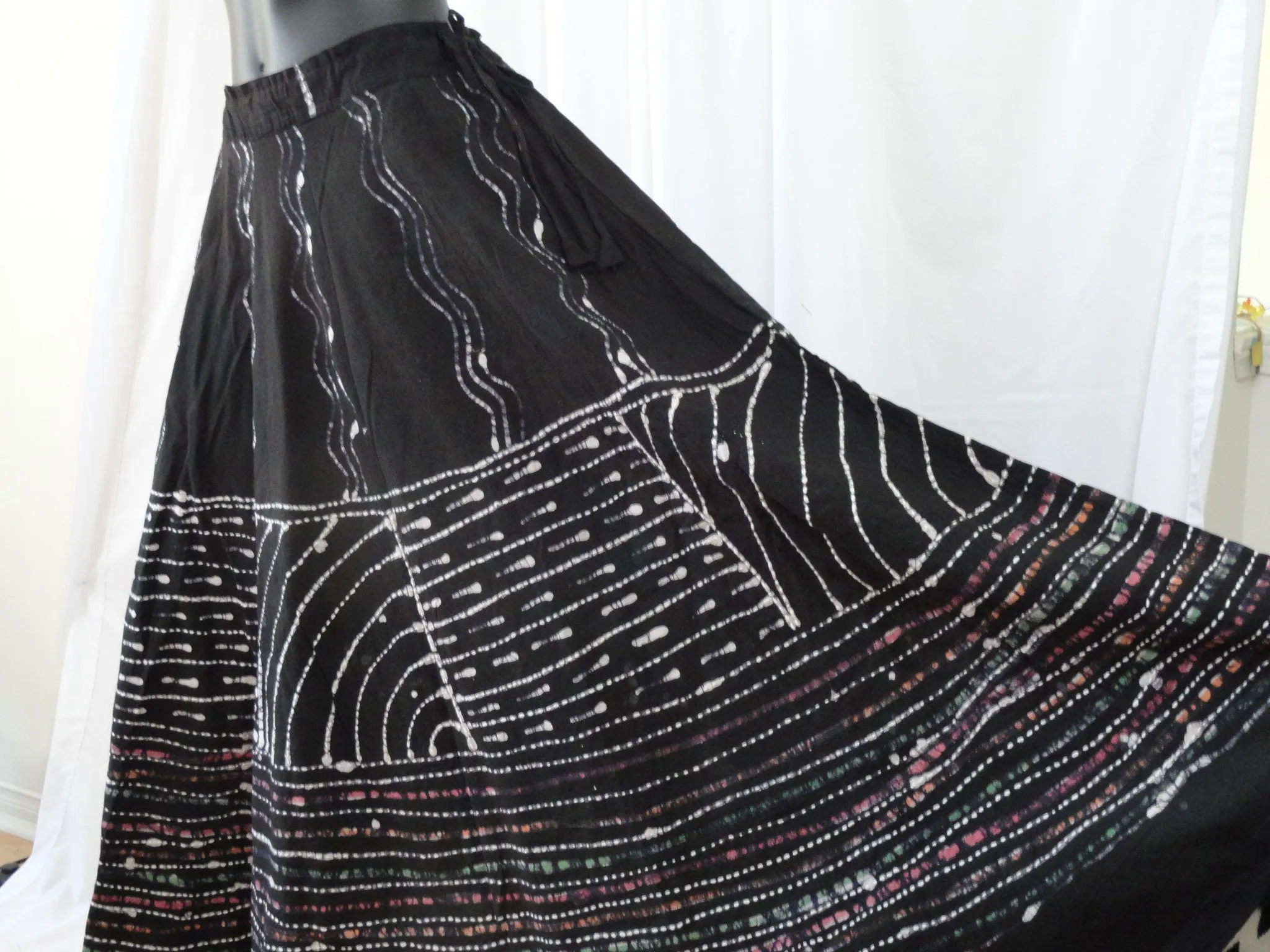 Black, hand painted skirt from India. Indian, cotton, long and wavy, dance, party skirt. From Artikrti