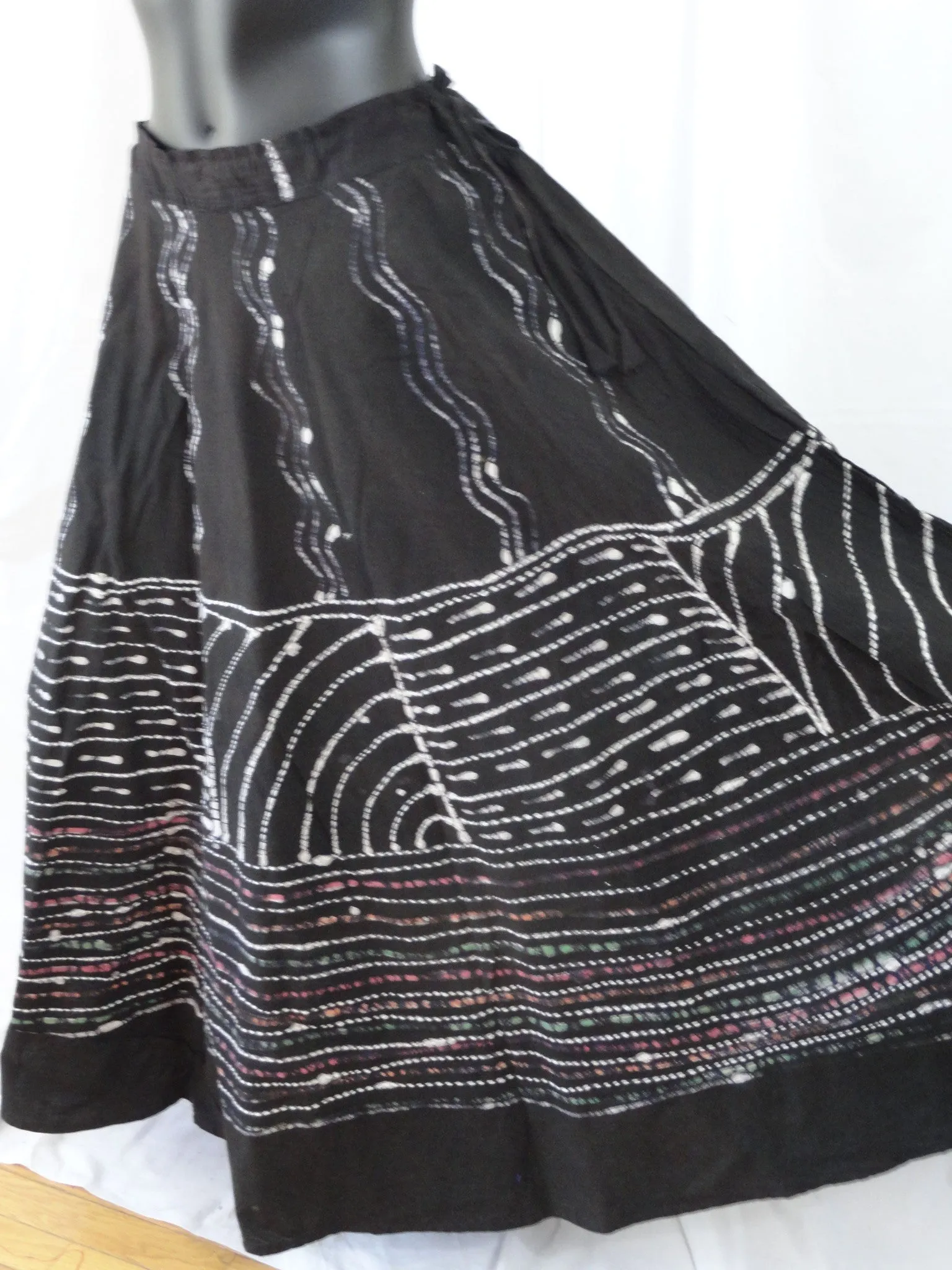 Black, hand painted skirt from India. Indian, cotton, long and wavy, dance, party skirt. From Artikrti