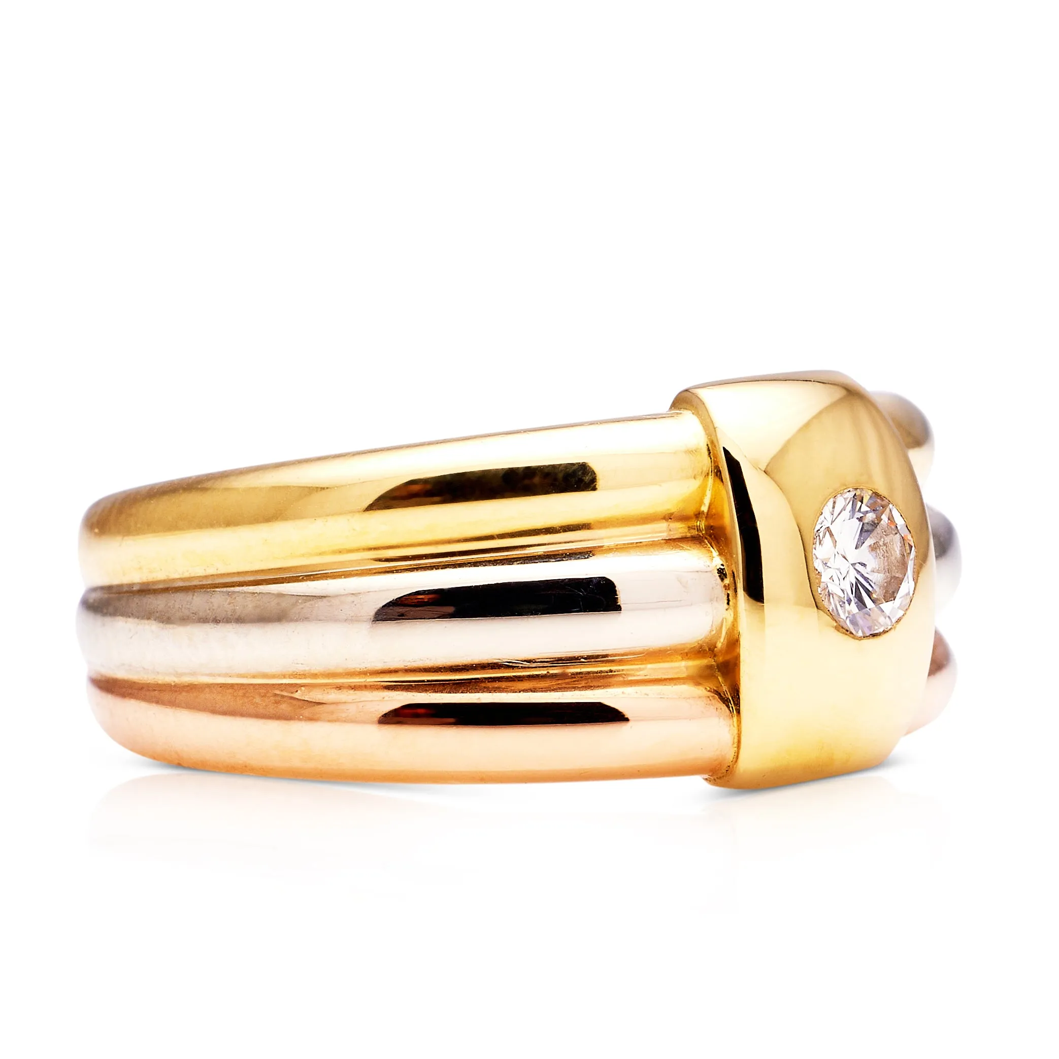 Cartier | a stylish 18ct rose, white and yellow gold diamond band, signed
