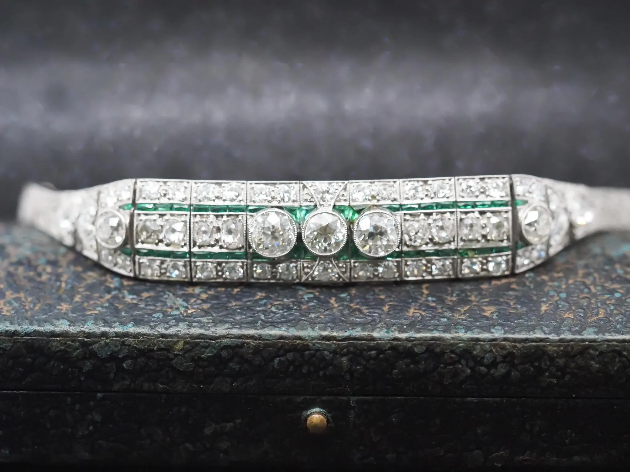 Circa 1920s Platinum Art Deco Old European Diamond and Emerald Bracelet