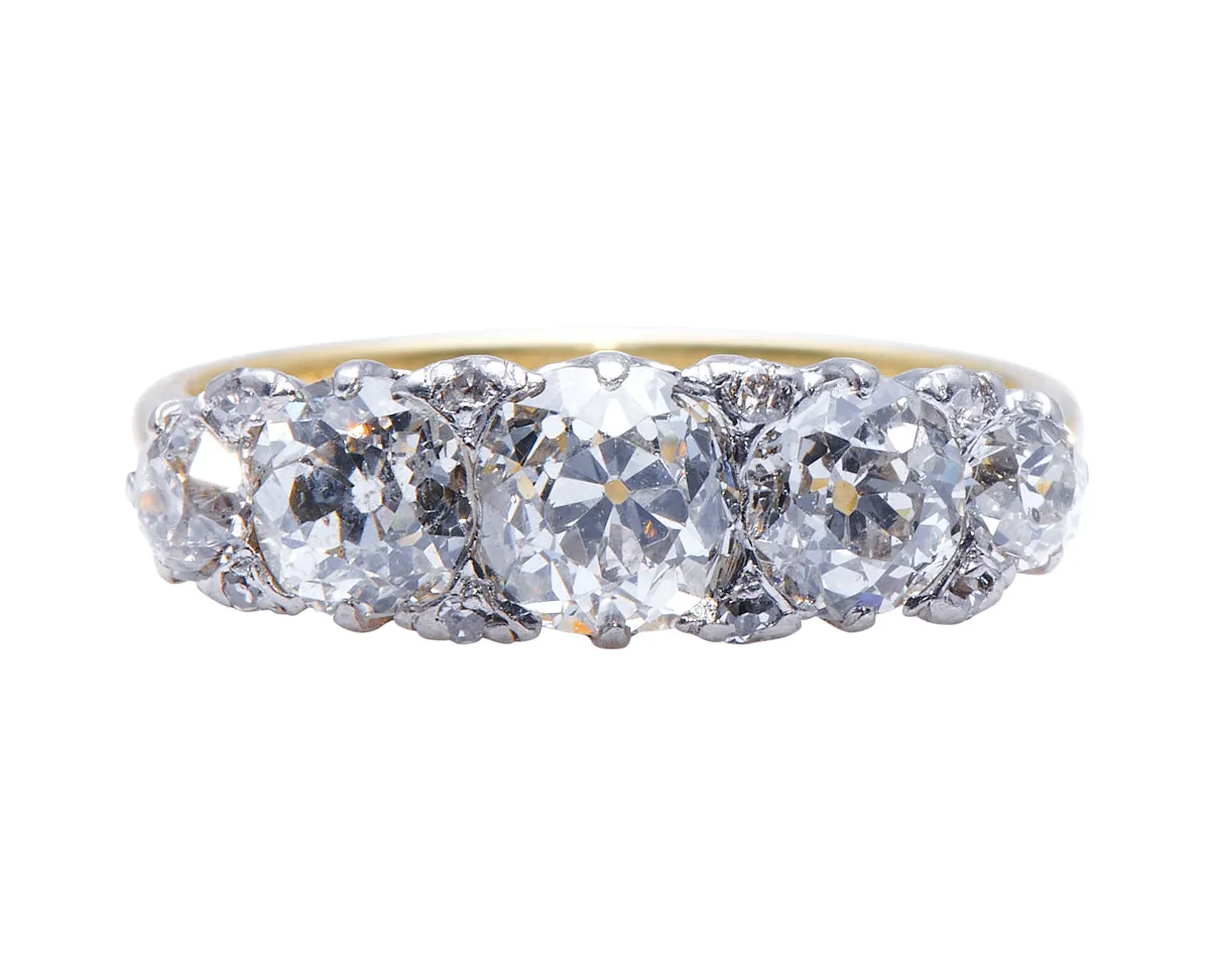 Edwardian, 18ct gold and platinum, old cushion-cut diamond five stone engagement ring