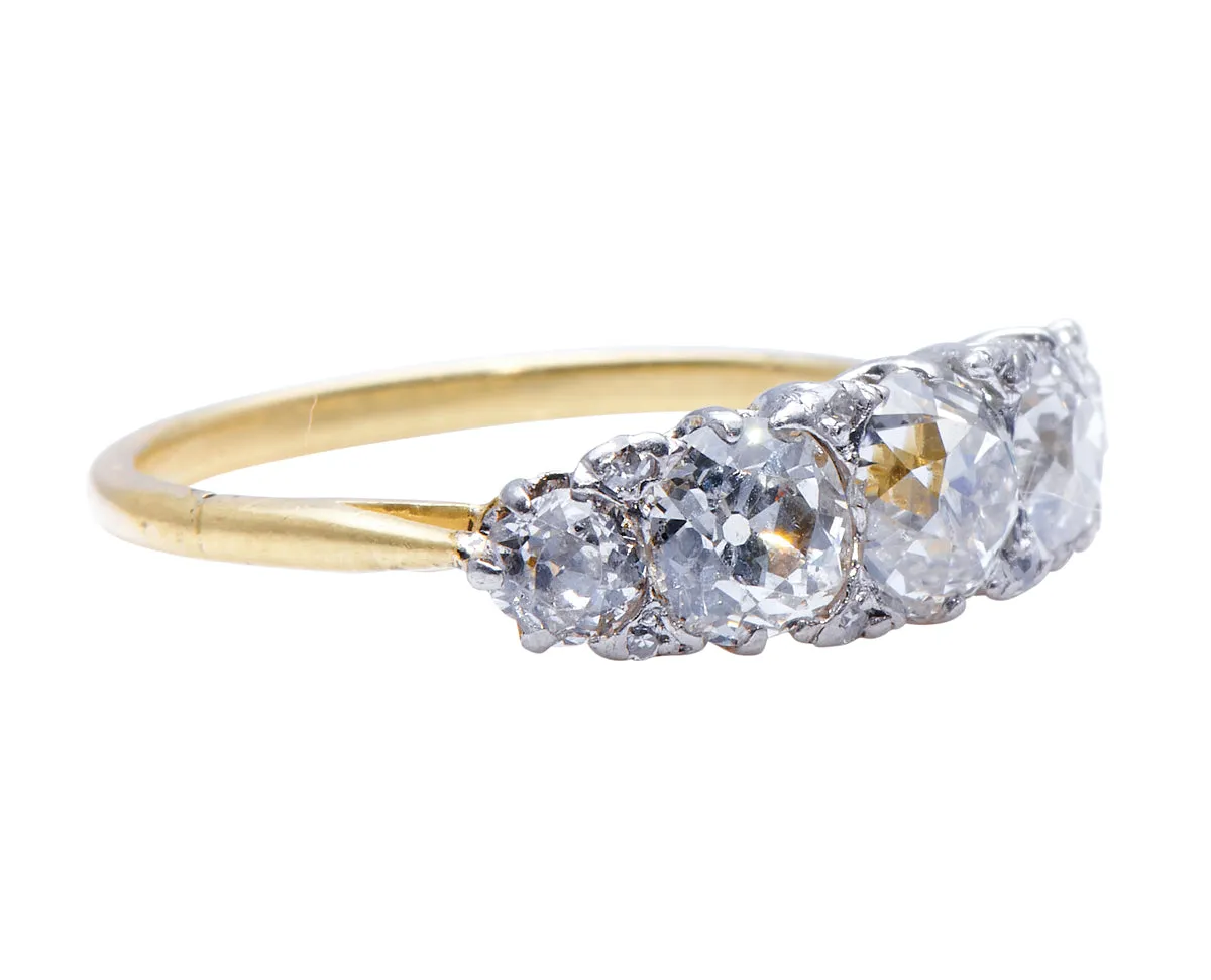 Edwardian, 18ct gold and platinum, old cushion-cut diamond five stone engagement ring