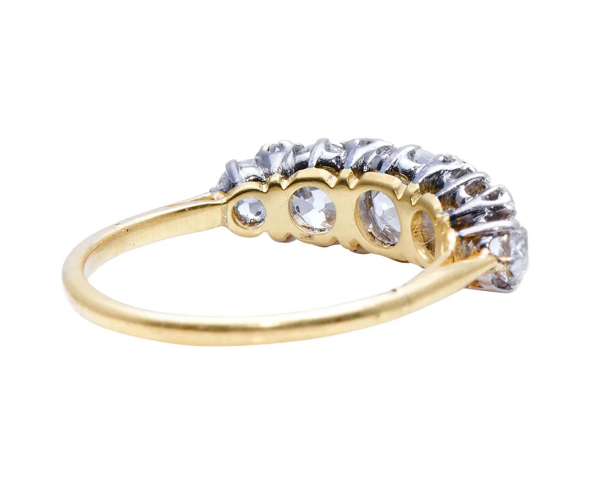 Edwardian, 18ct gold and platinum, old cushion-cut diamond five stone engagement ring