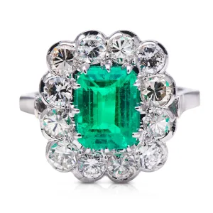 Engagement | 18ct white gold, Colombian emerald and diamond cluster ring