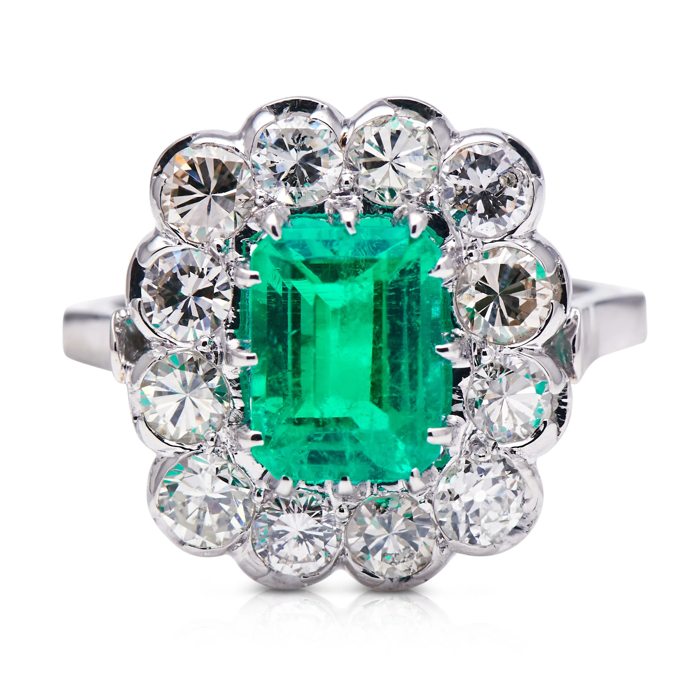 Engagement | 18ct white gold, Colombian emerald and diamond cluster ring