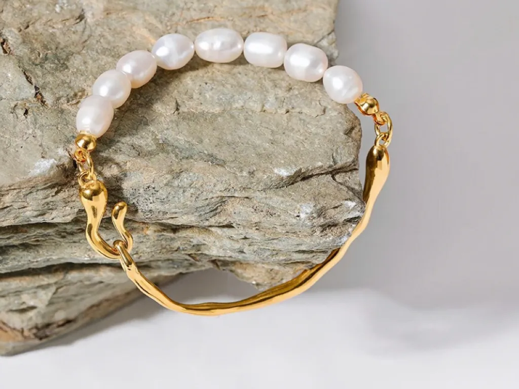 Enya Gold Tone Angelic Pearl Luxury Bracelet
