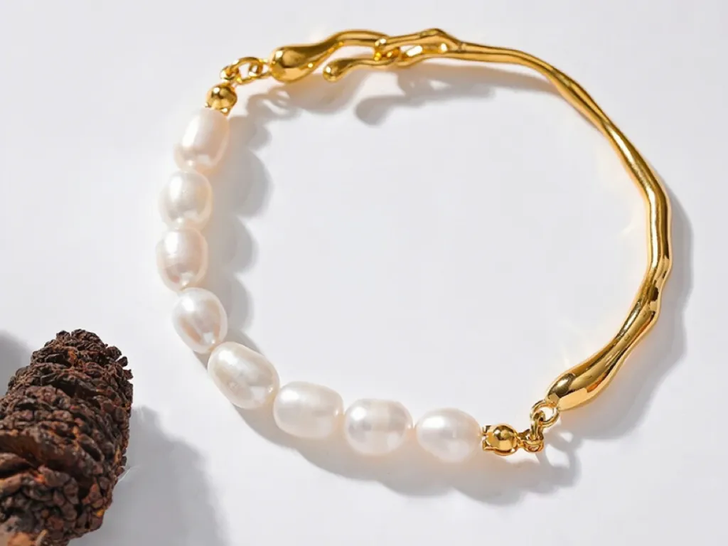 Enya Gold Tone Angelic Pearl Luxury Bracelet