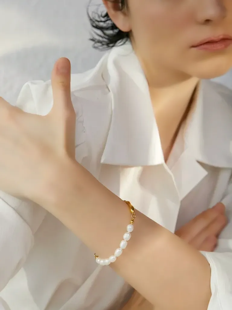 Enya Gold Tone Angelic Pearl Luxury Bracelet