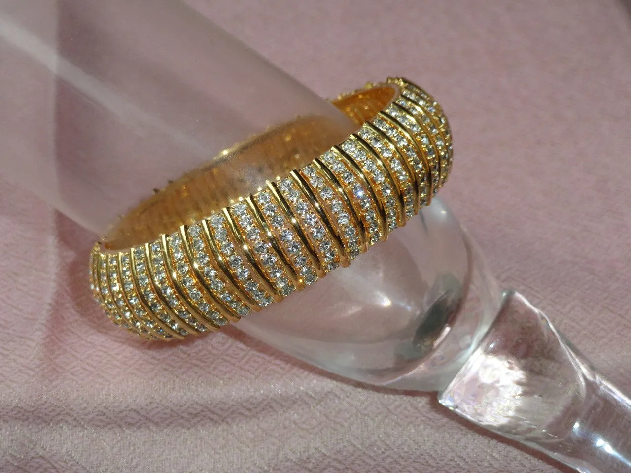 Ethnic white stone broad bangle. Indian, handmade wedding bangle bracelets. Gold covered brass wrist wear.  The "Queen's Band". From Artikrti.