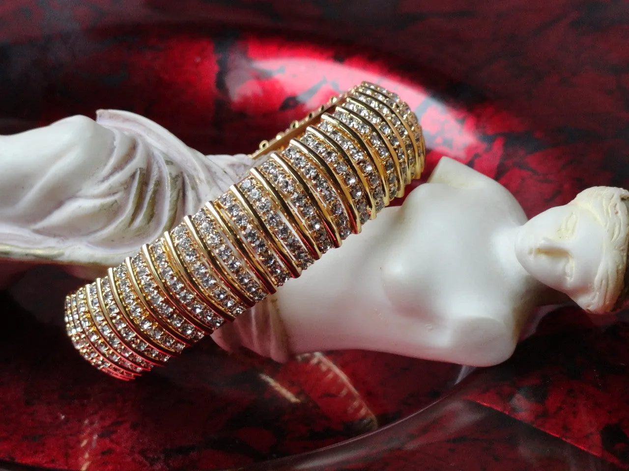 Ethnic white stone broad bangle. Indian, handmade wedding bangle bracelets. Gold covered brass wrist wear.  The "Queen's Band". From Artikrti.