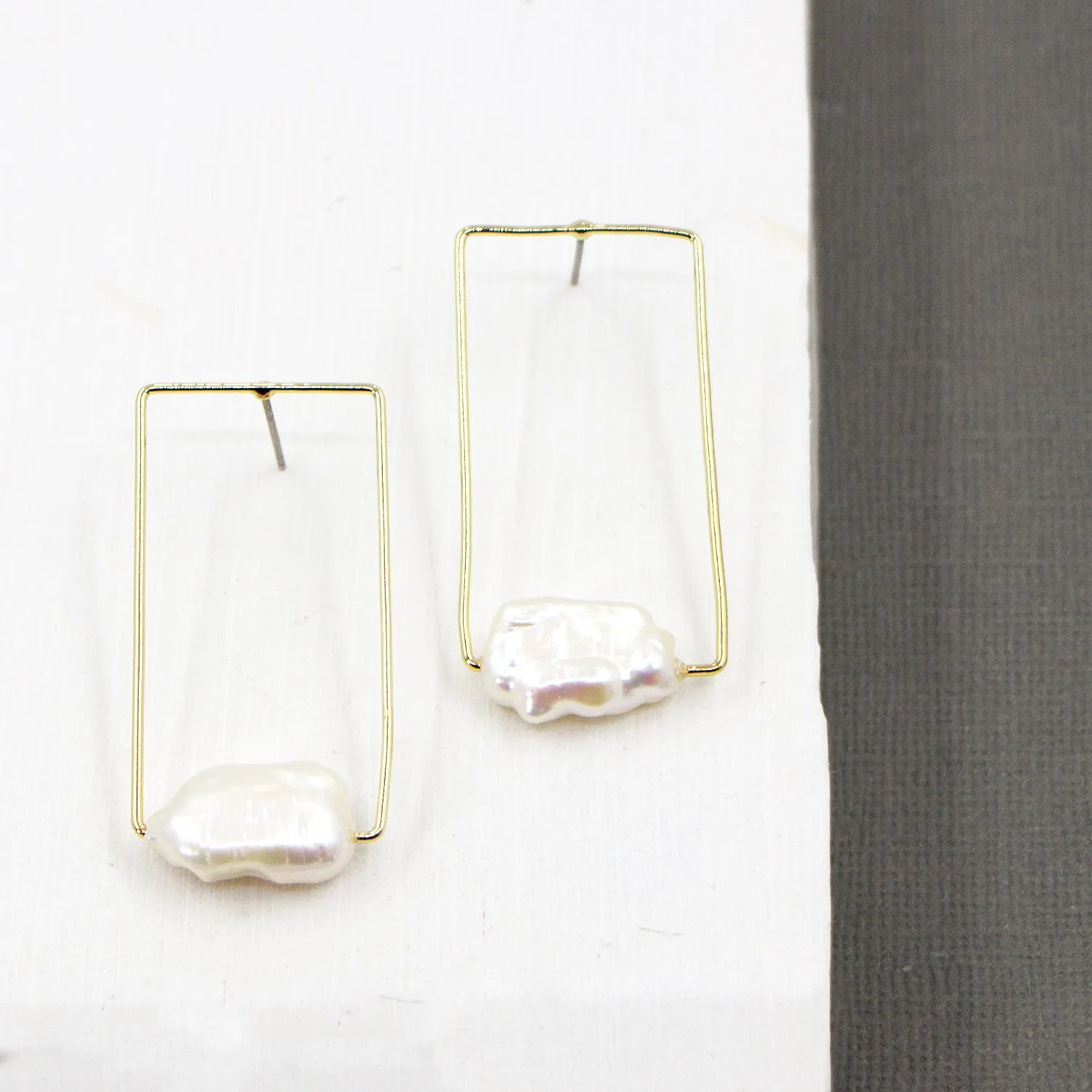 Real button pearls on contemporary square setting