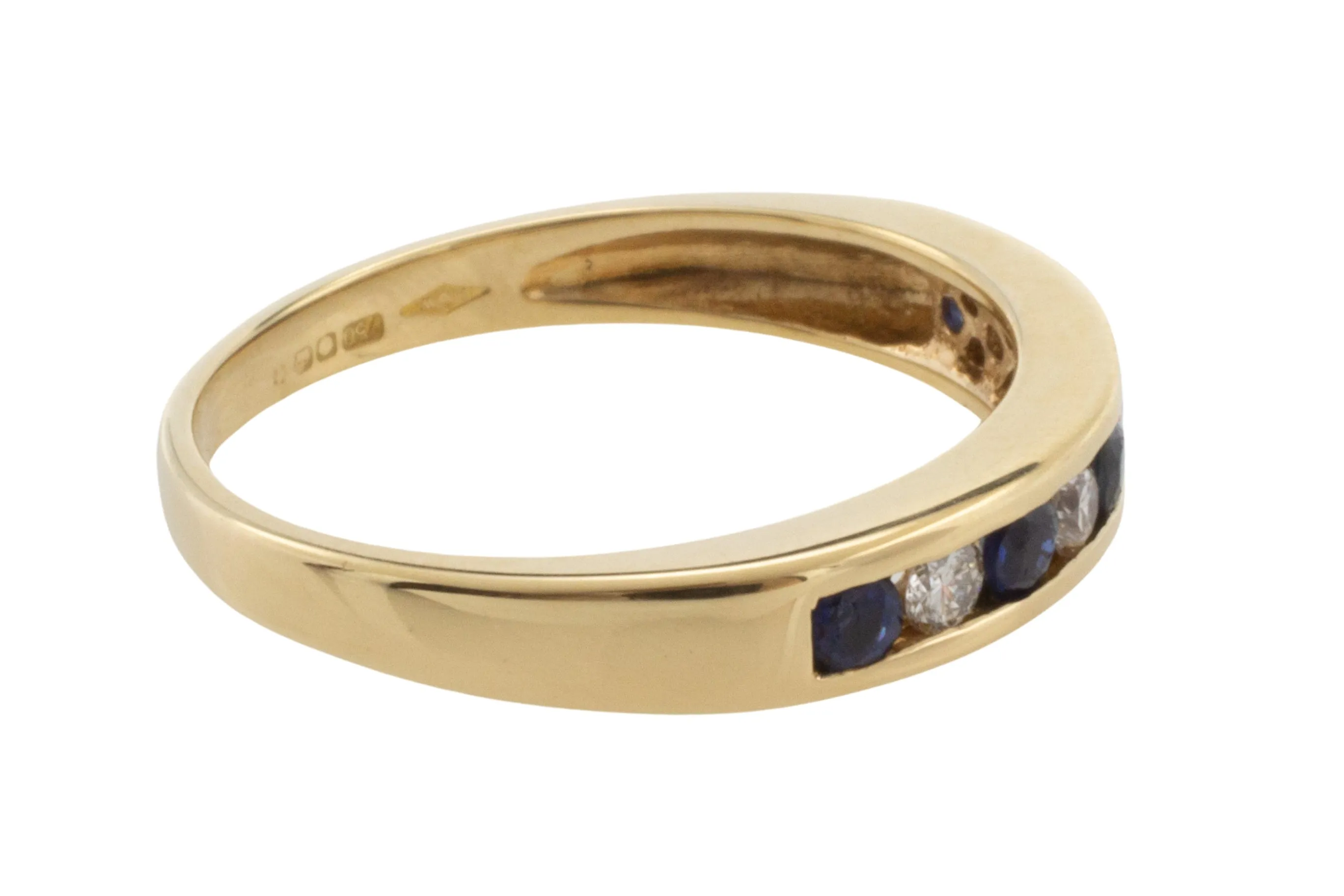 Sapphire and diamond band in 18 carat gold