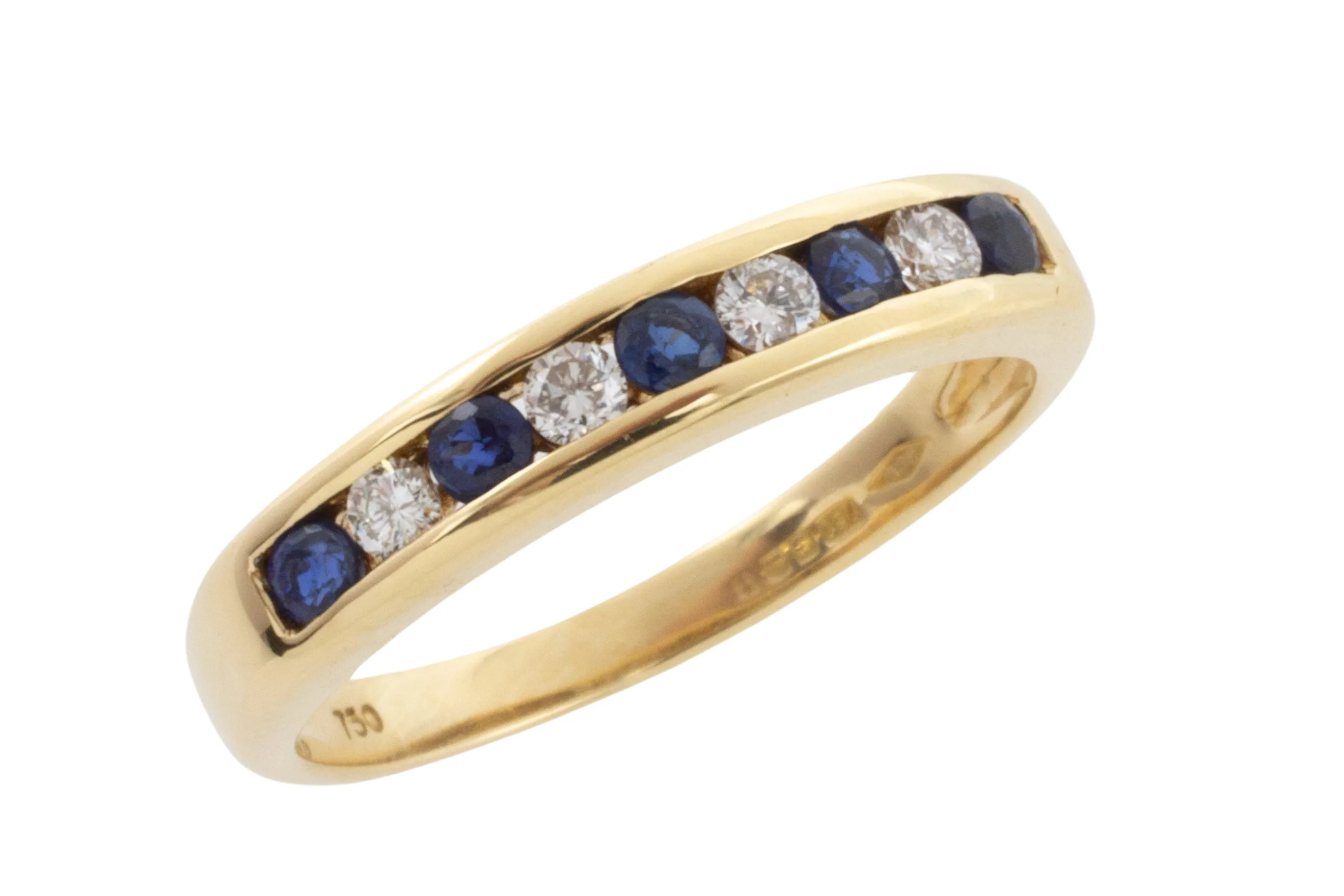 Sapphire and diamond band in 18 carat gold