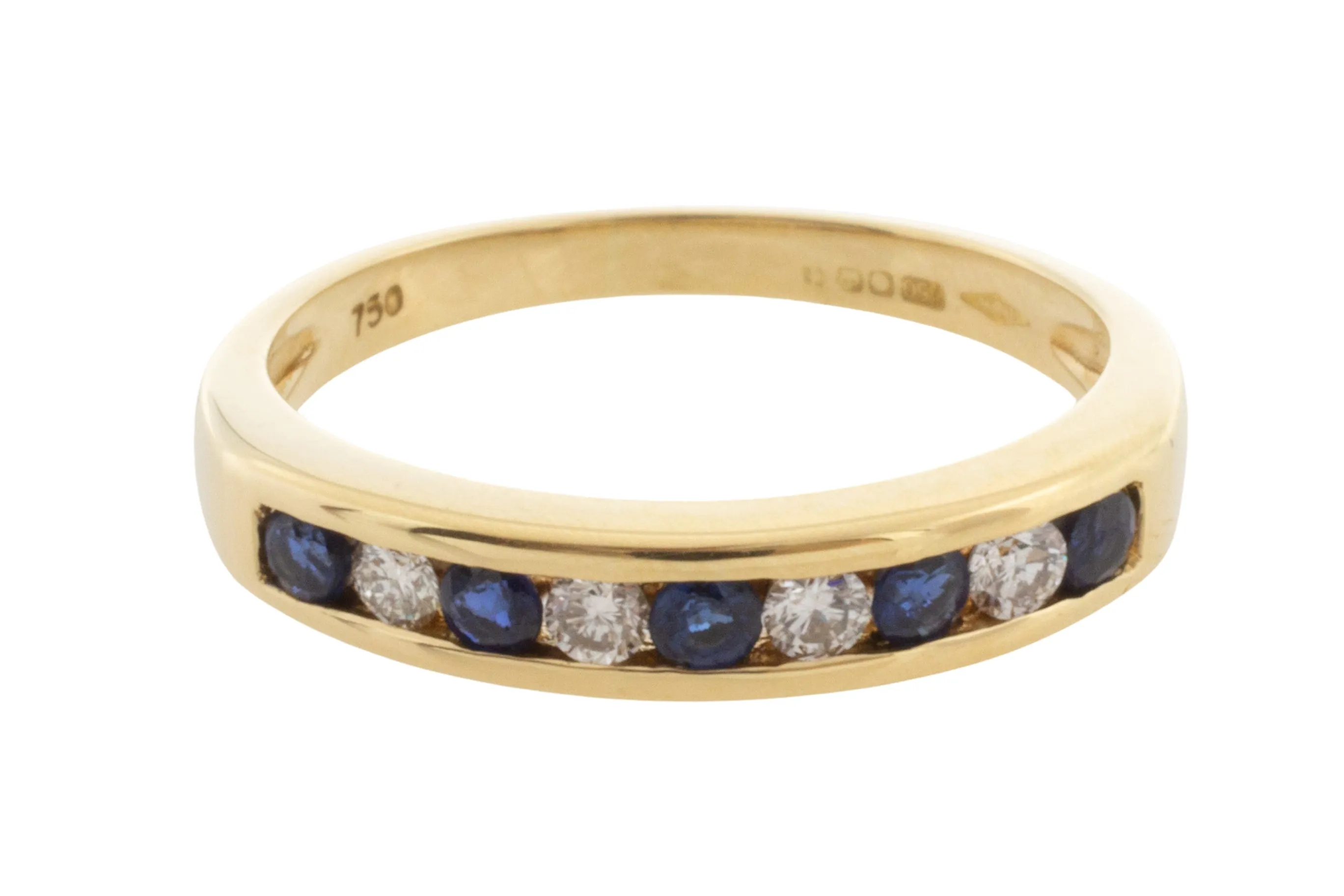Sapphire and diamond band in 18 carat gold