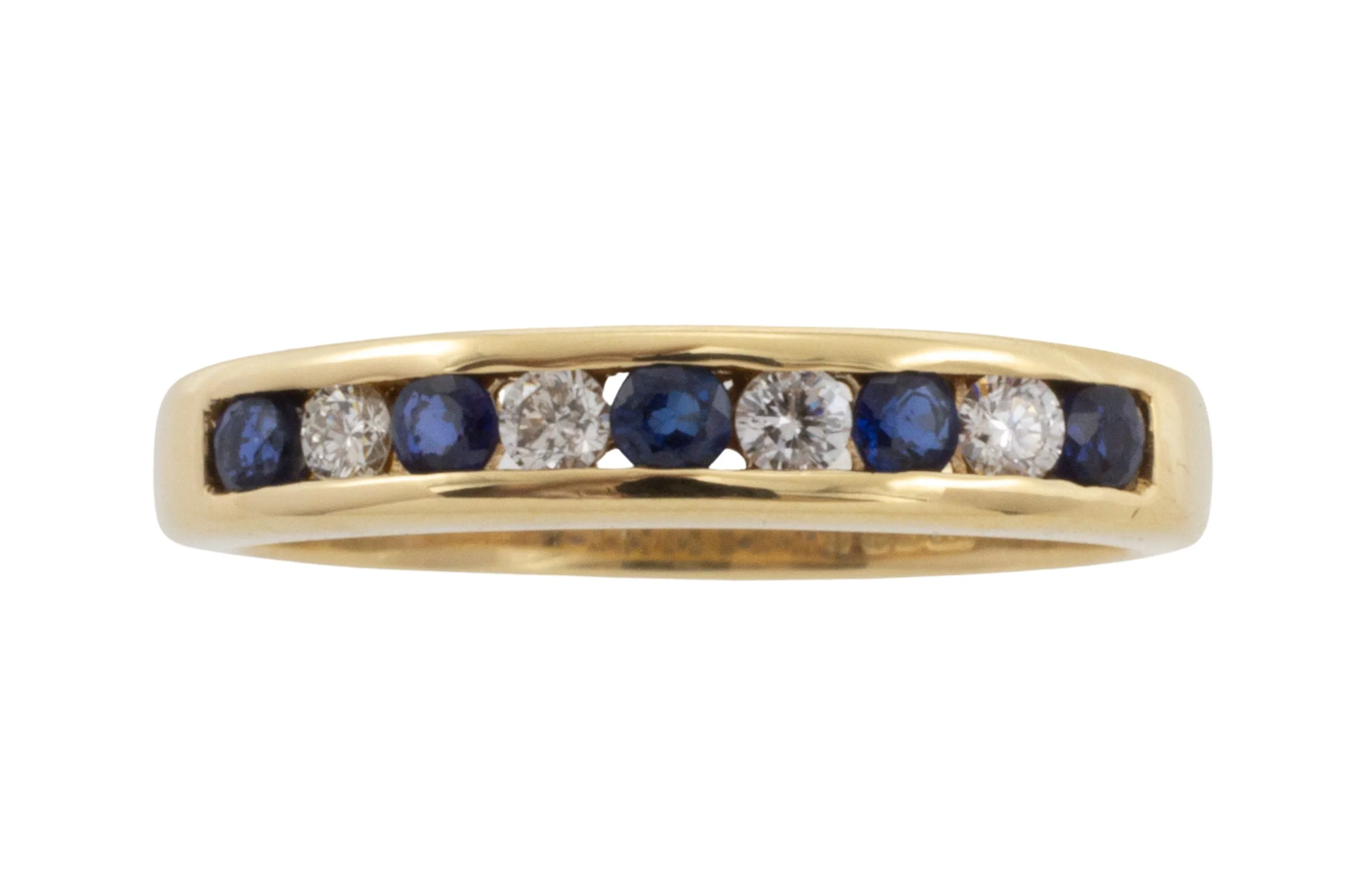 Sapphire and diamond band in 18 carat gold