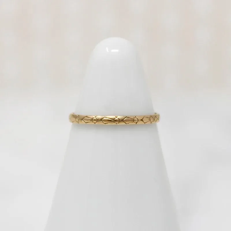 Sweetest Slip of a Floral Patterned Gold Tiny Ring