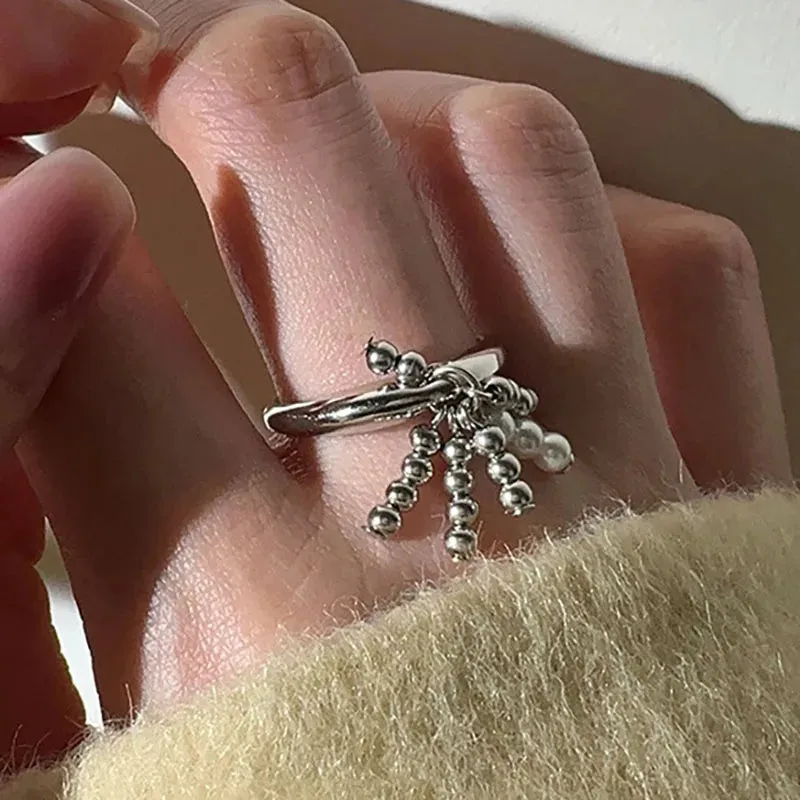 VAIGE Enchanting Silver Tassel Ring with Vibrant Green Zircons