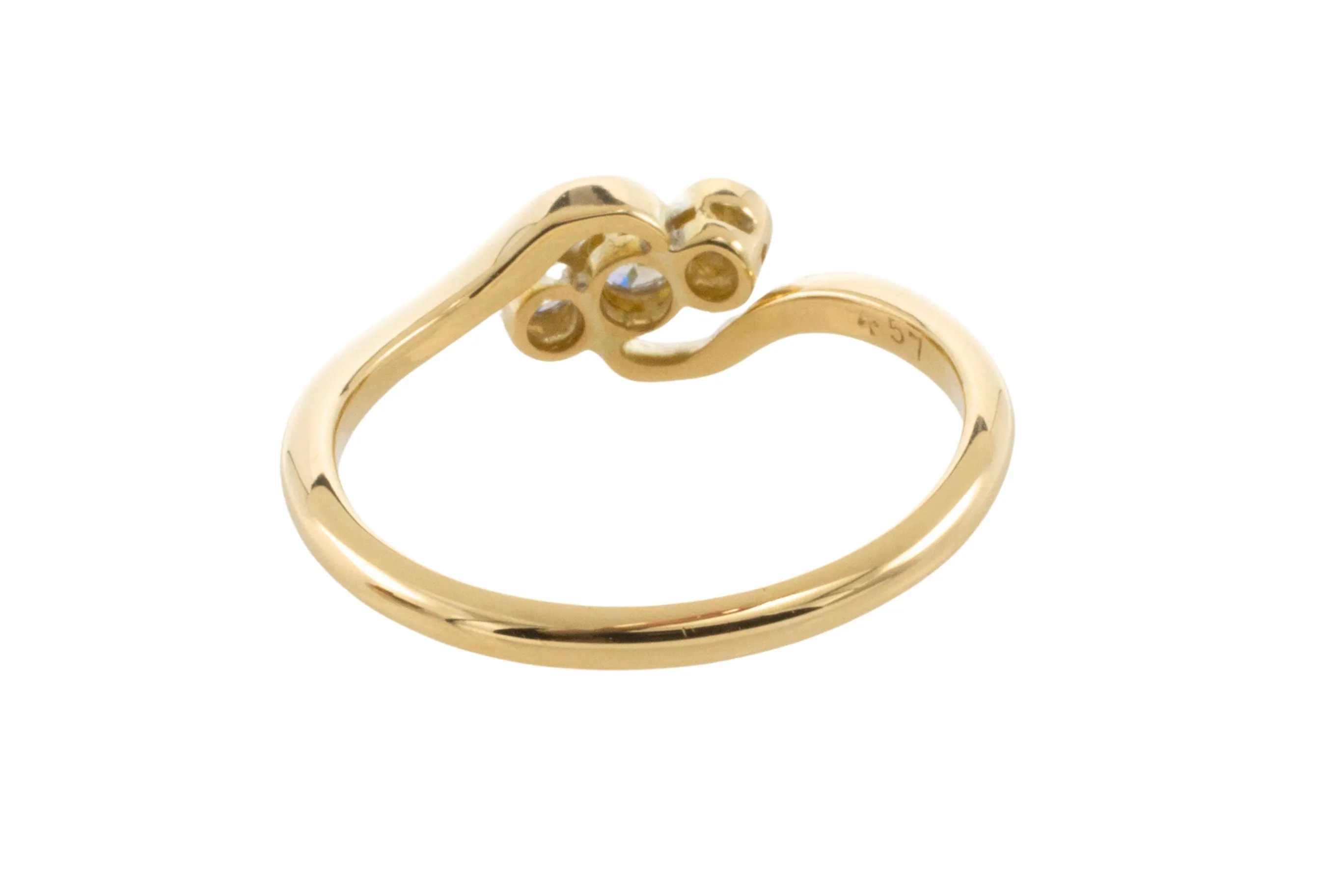 Vintage 18 carat gold swirl ring with diamonds