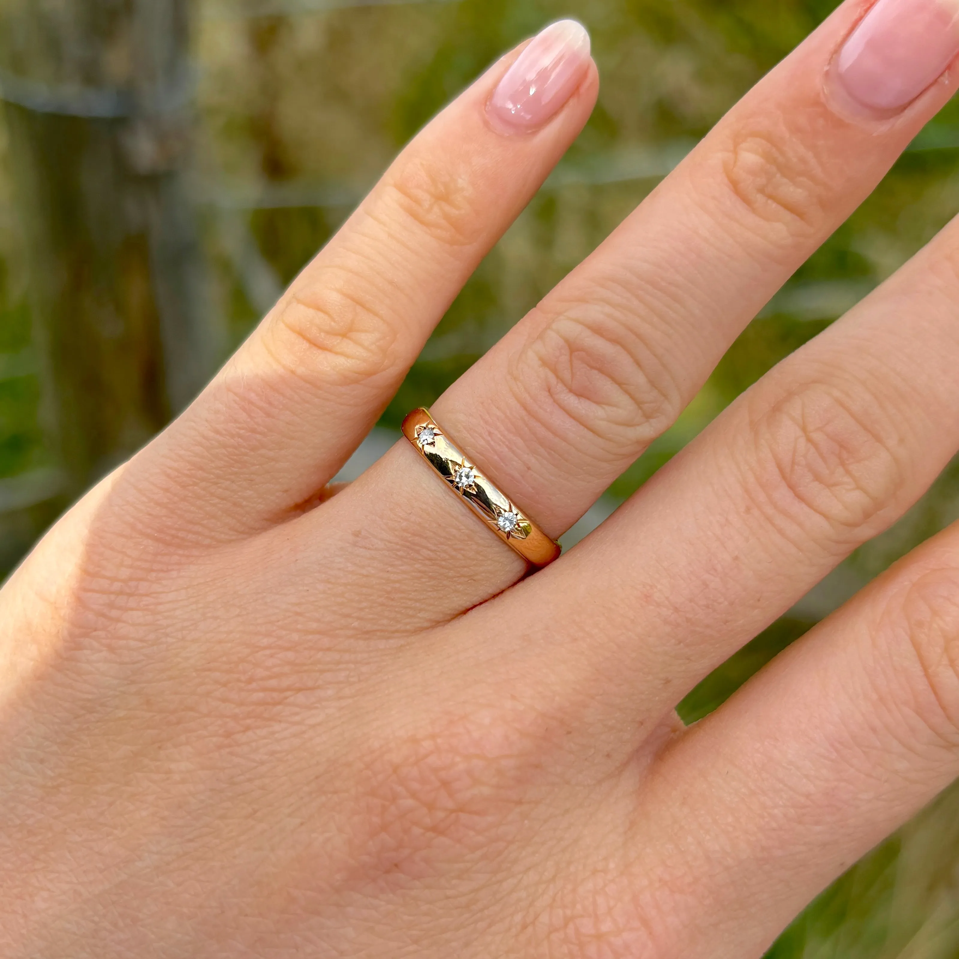 Vintage, 1960s three-stone diamond band