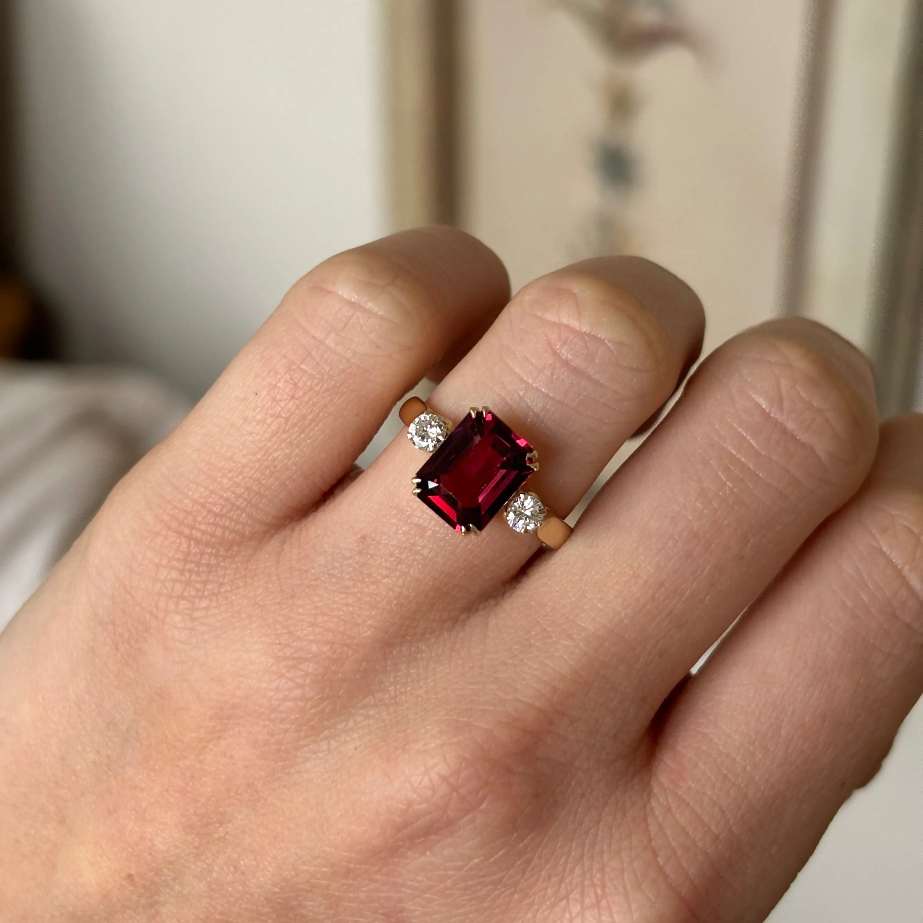 Vintage, three-stone garnet & diamond ring